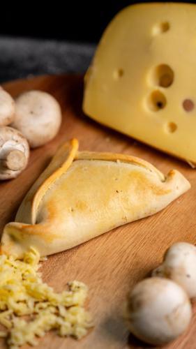 Champiñón Queso - $3.000